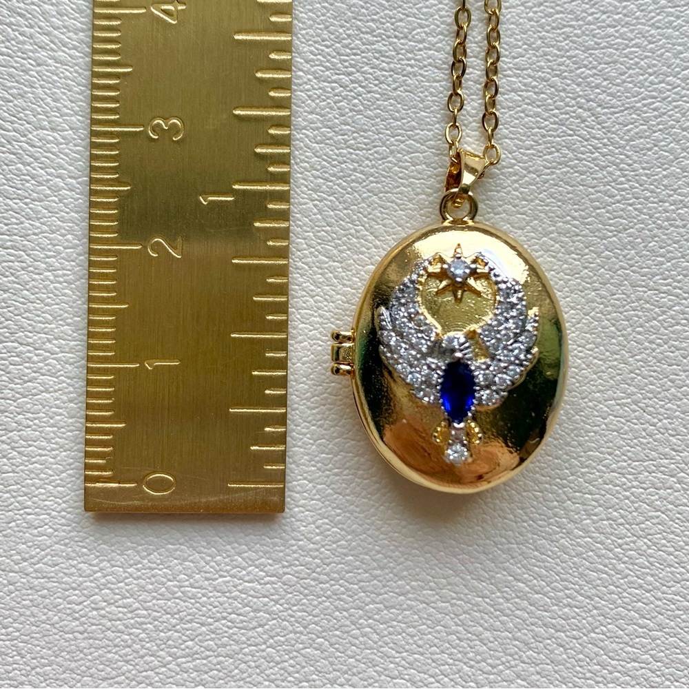 Elegant Gold and Blue Locket Necklace